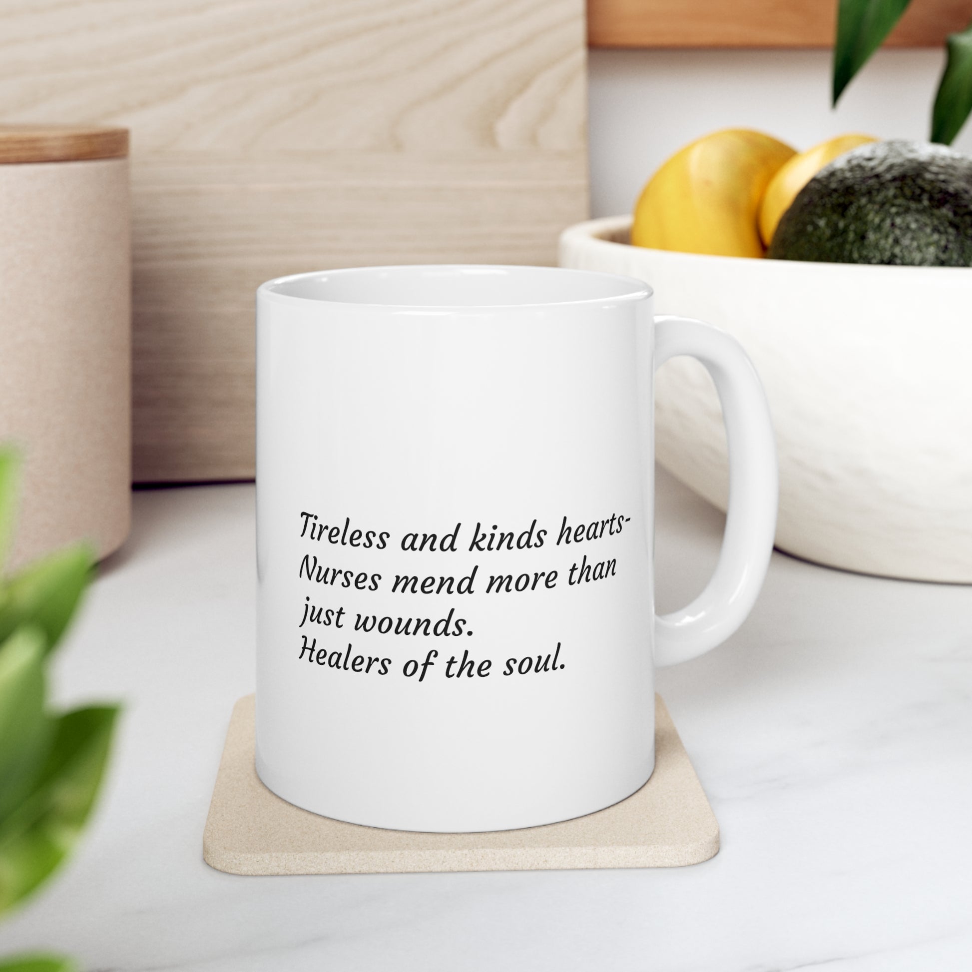 White 11 oz. mug with Orange Nurse Power logo on one side and text on the other side that says "Tireless and kind hearts- Nurses mend more than just wounds. Healers of the soul."